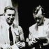 Symposium v Cold Spring Harbor v roce 1949. Muž, jenž je zaneprázdněný zapisováním si poznámek, je Paul Zamecnik. Na fotografii můžete také vidět J. S. Frutona (vlevo), K. Linderstrom-Langa (vpravo).