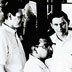 1966 Symposium v Cold Spring Harbor o syntéze proteinů. Zleva doprava: Marshall Nierenberg, B. P. Doctor, C. T. Caskey.